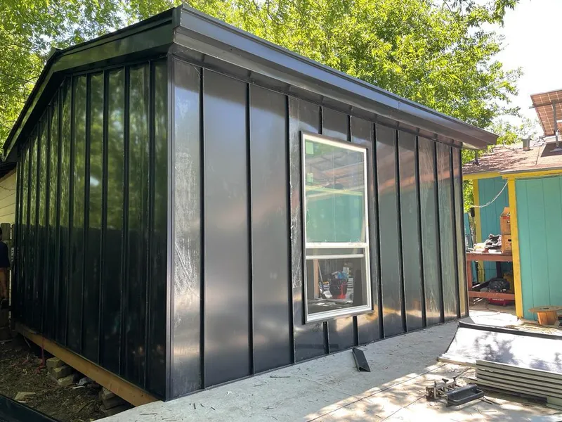 Black standing seam metal wall panels for Metal Roof Installation in Rensselaer