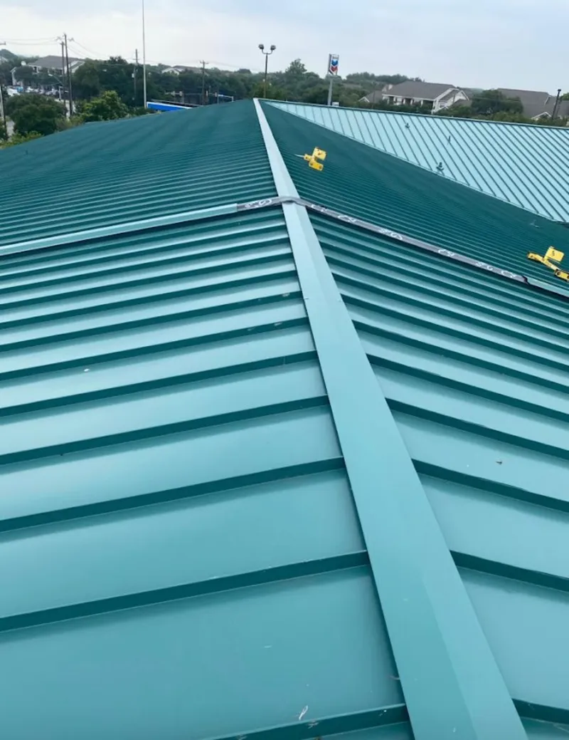 Green commercial metal roof ridge and valley for Metal Roof Repair in Rensselaer