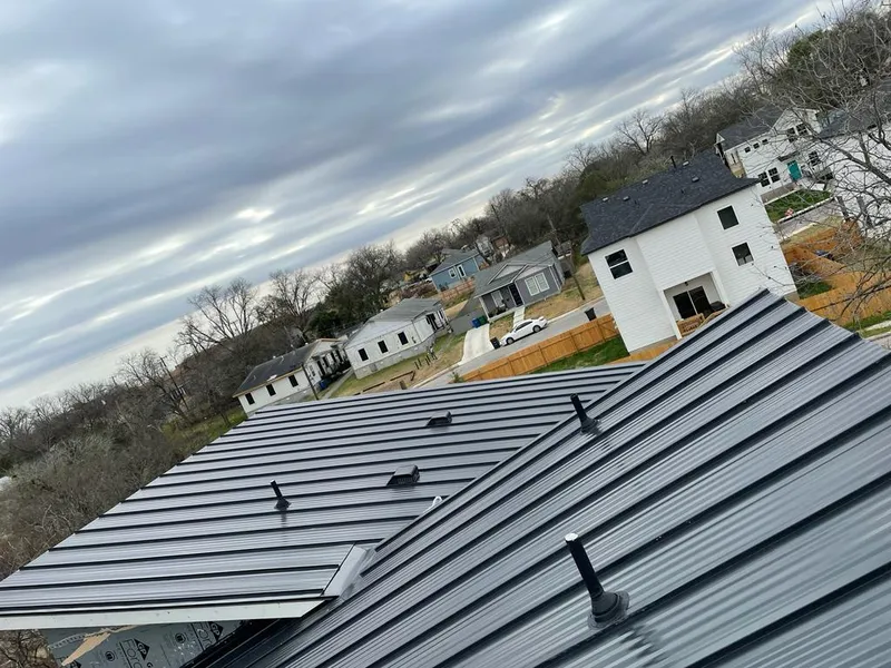 Standing seam metal roof panels with vents for Skylight Repair in Rensselaer